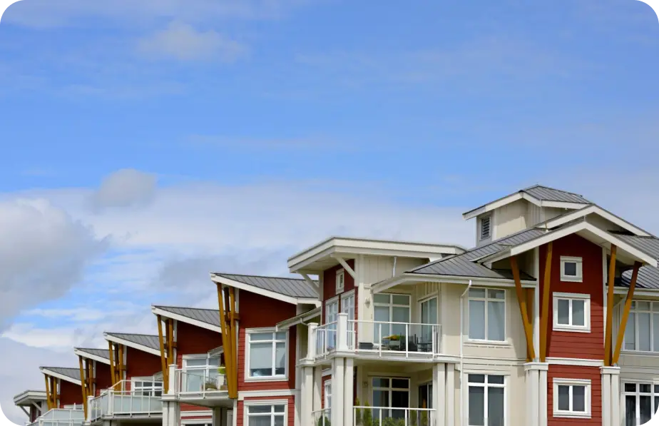 Craftsman-style homes with red and cream exterior paint