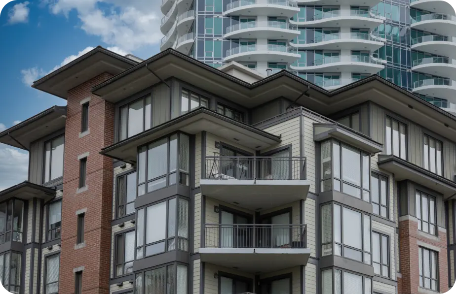 Mixed-material apartment building with freshly painted facade